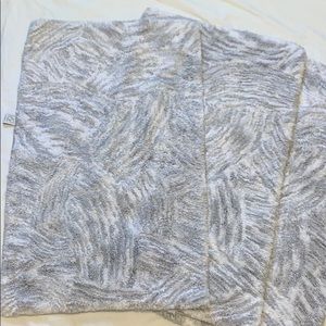 3 Gray and white rugs